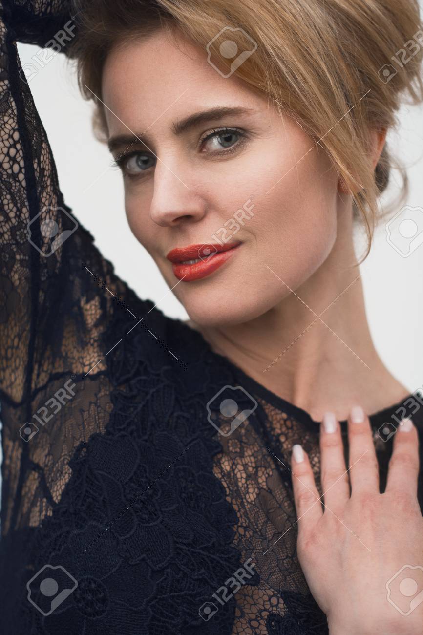 Close Up Portrait Of Good Looking Blonde Sweet Blonde Lady Raising Her Hair Above Her Close Up Portrait Of Good Looking Blonde Sweet Blonde Lady Raising Her Hair Above Her