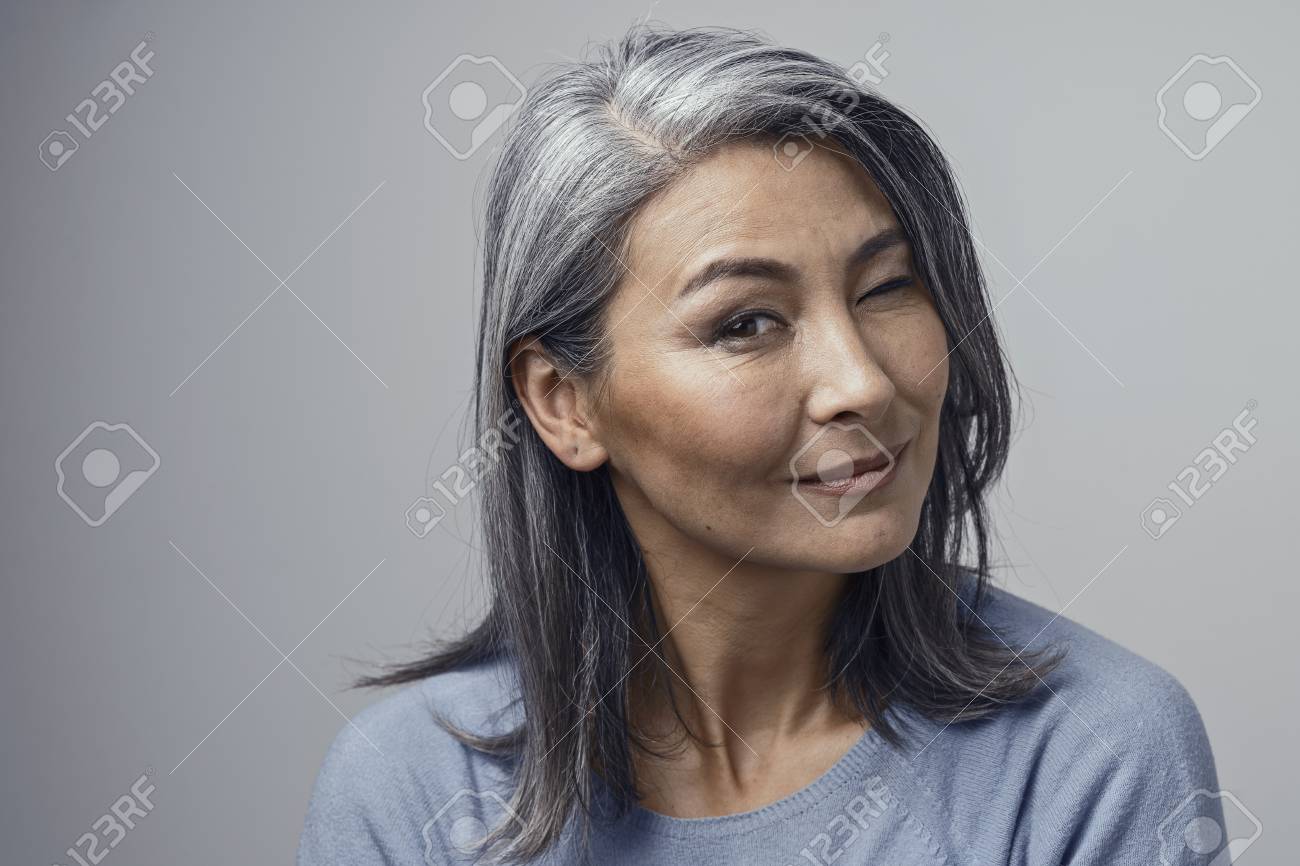 Beautiful Asian Grey Haired Women With Natural Make Up And Cheekbones