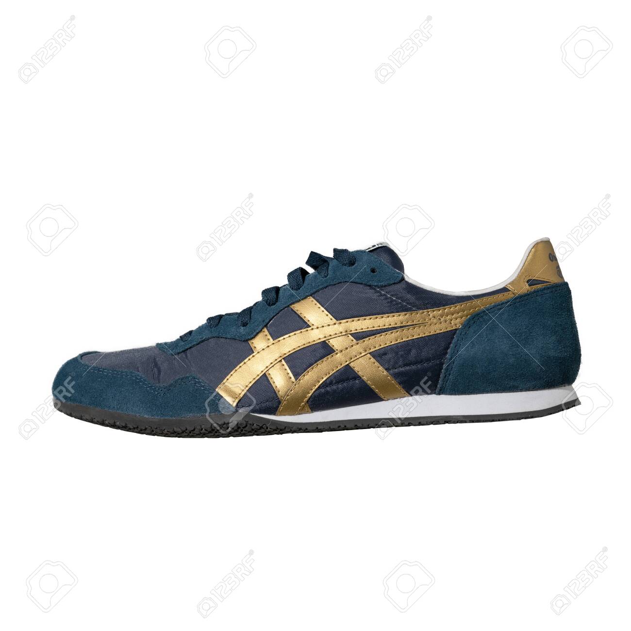 gold asics sneakers