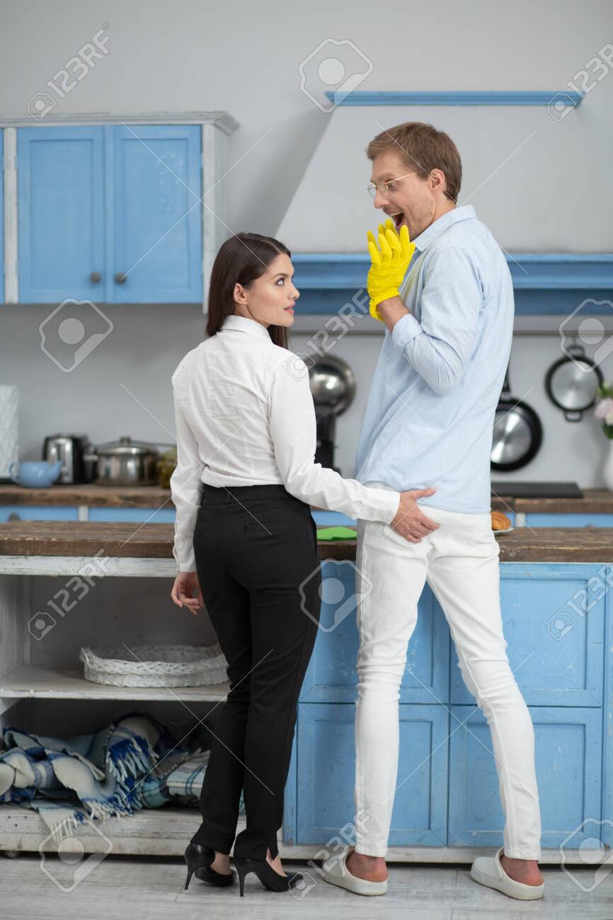 Svyatoslav LypynskyyPlayful Woman Grabbing Her Husbands