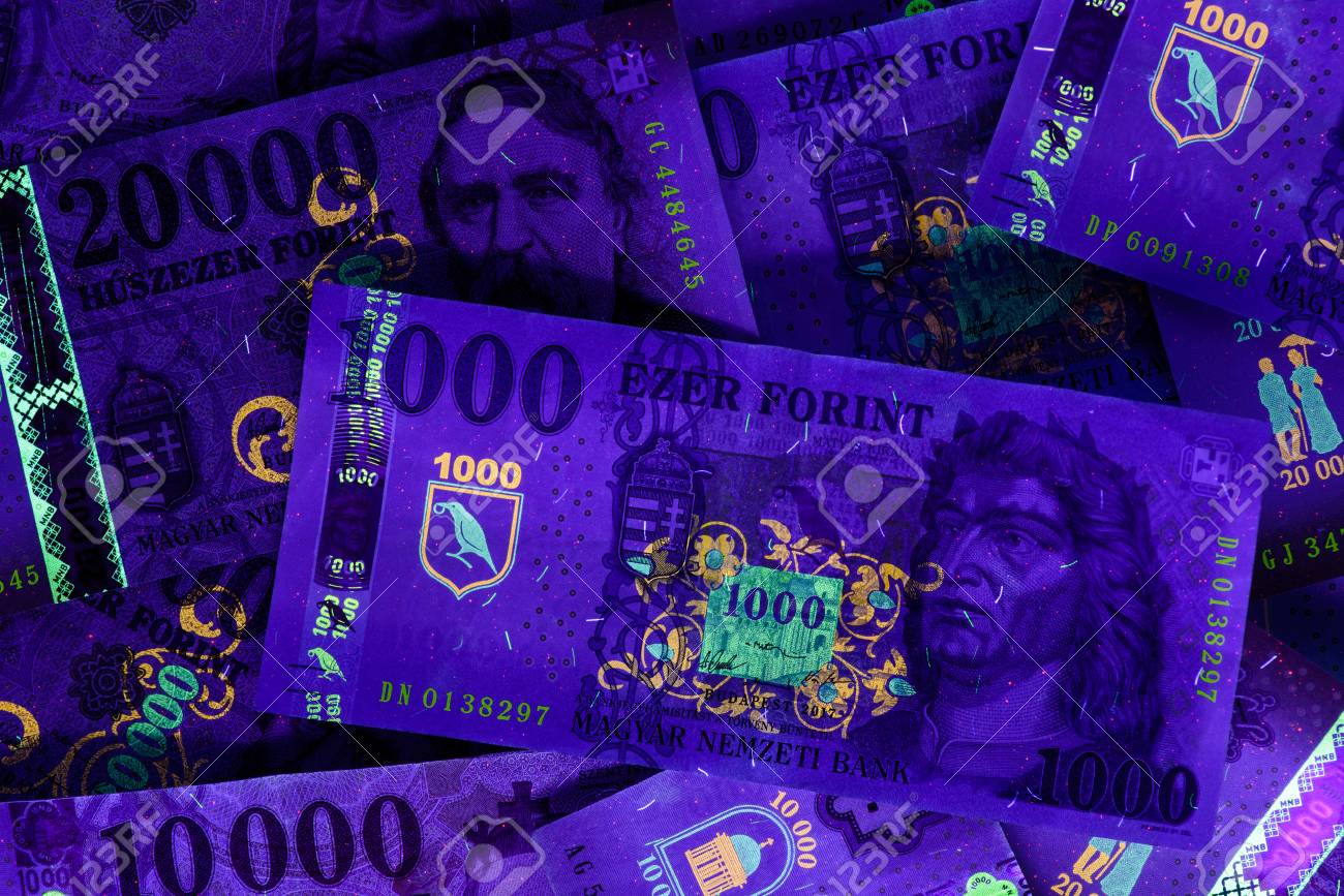 Different Hungarian Banknotes In UV Light, 1-10-20 Thousand HUF.  Fluorescent Motives Are Clearly Visible. Europe Hungary. Stock Photo,  Picture and Royalty Free Image. Image 119308229.