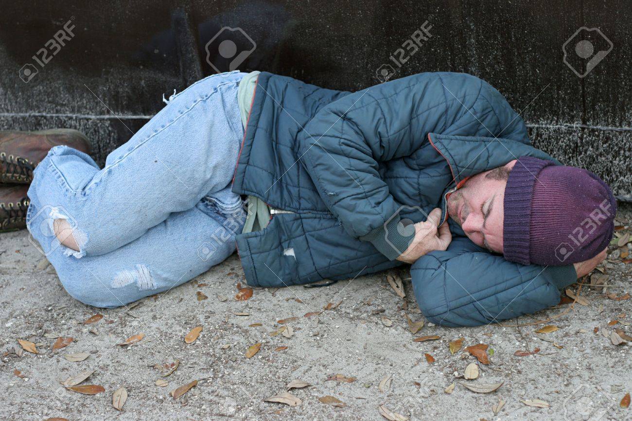 A Homeless Man Sleeping On The Ground Beside A Dumpster Stock Photo Picture And Royalty Free Image Image A Homeless Man Sleeping On The Ground Beside A Dumpster Stock Photo Picture And Royalty Free Image Image