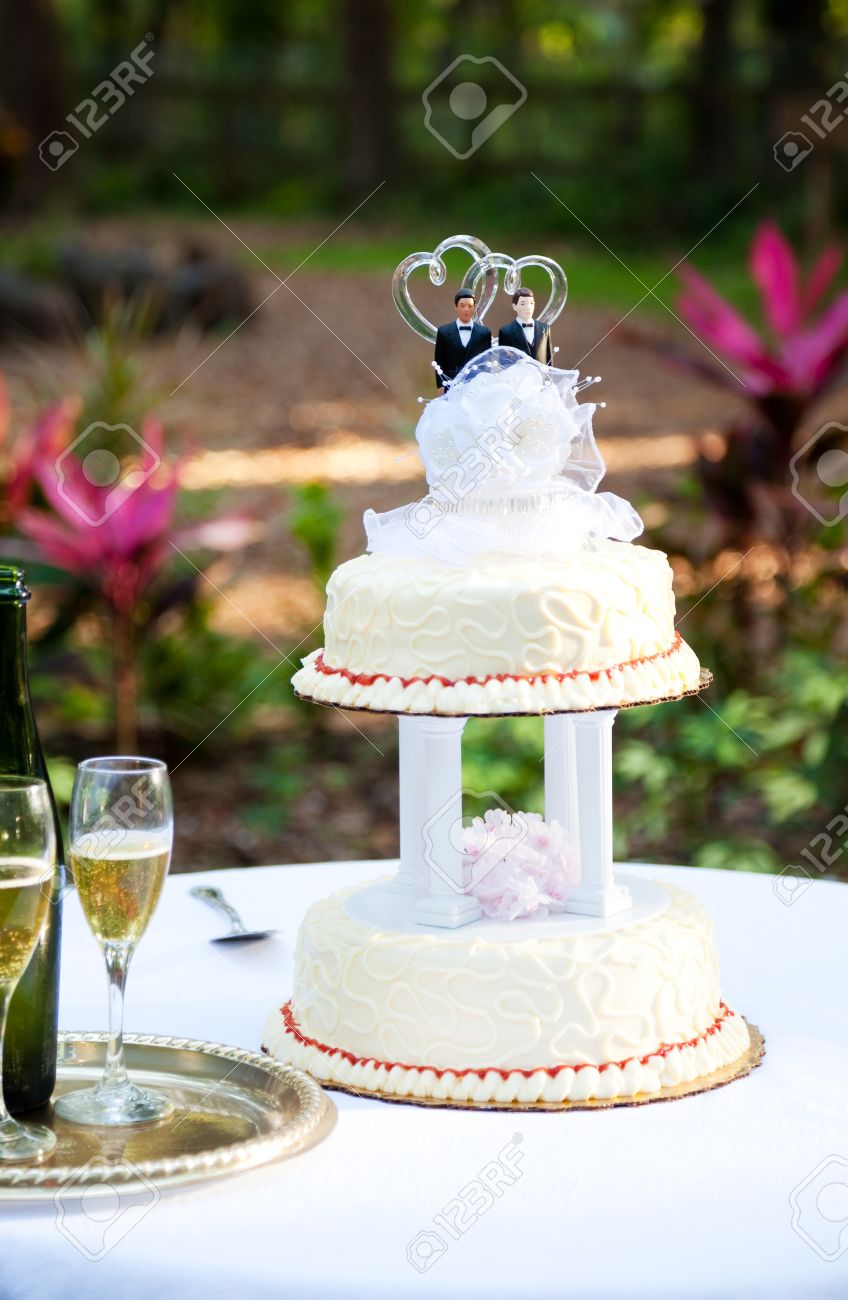 Wedding Cake And Champagne Set Up On A Table In The Garden. .. Stock ... Wedding Cake And Champagne Set Up On A Table In The Garden. .. Stock ...