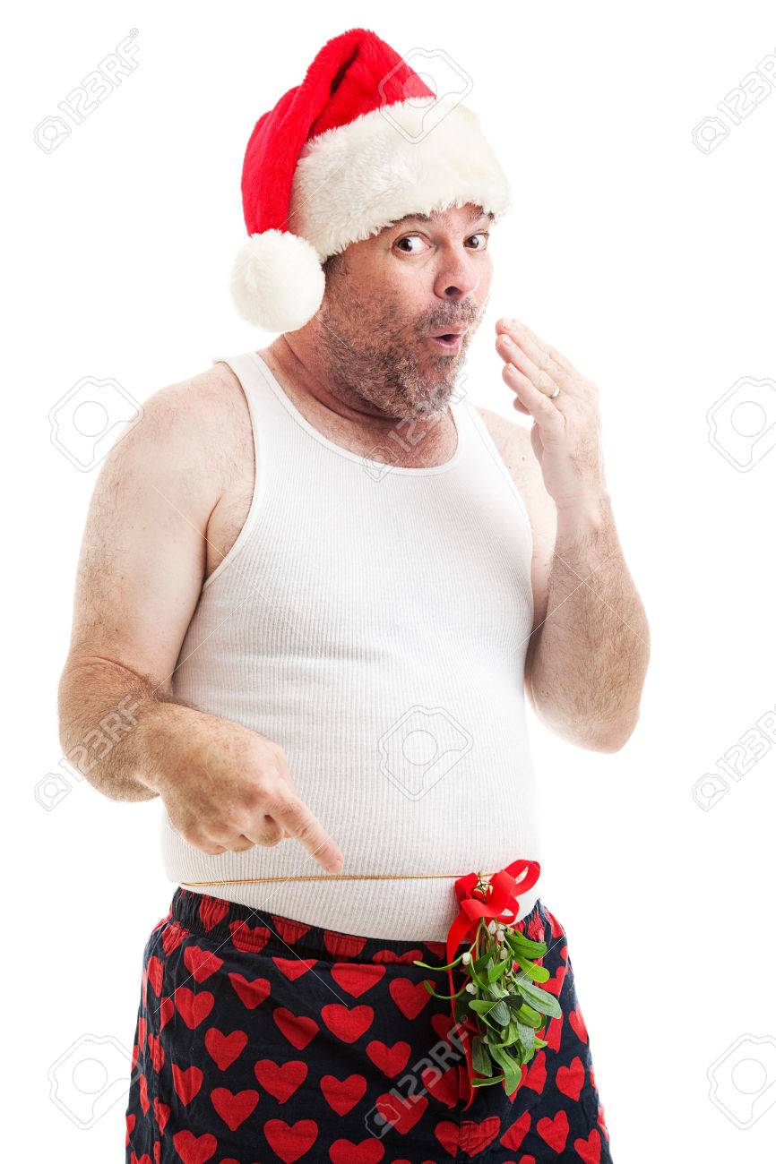 Desaliñado Hombre En Ropa Interior Con El Muérdago De Navidad Atada A La Cintura, Mirando Traviesa. Aislado En Blanco. Fotos, Retratos, Imágenes Y Fotografía De Archivo Libres De Derecho. Image 31041206.