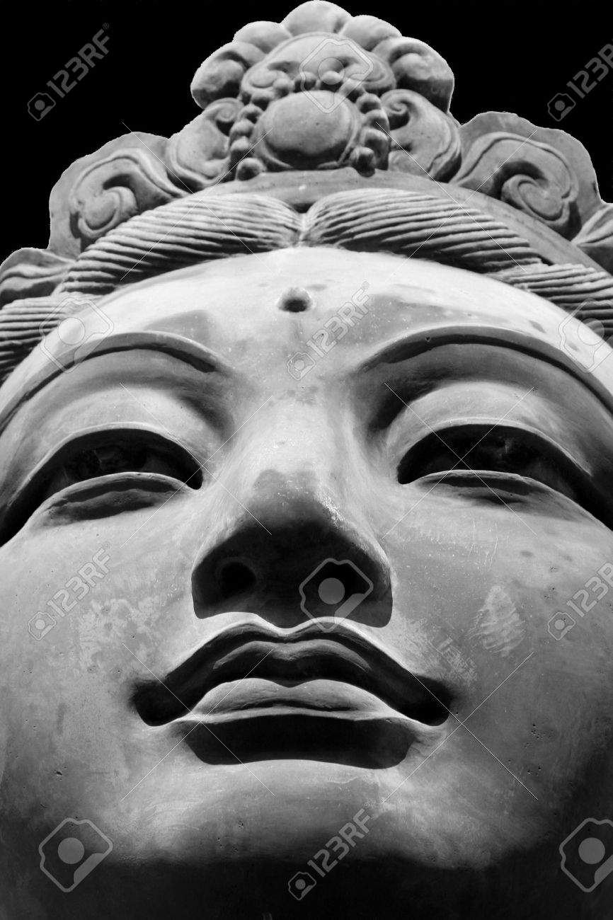 Black white close up of one of the six the offering of the six devas statues