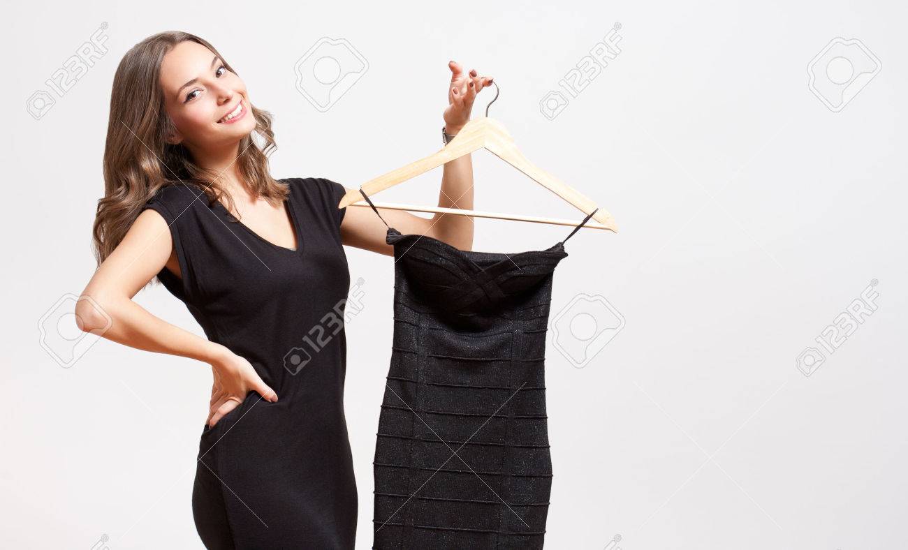 Portrait of a young brunette beauty having shopping fun. - 49189172 Portrait of a young brunette beauty having shopping fun. - 49189172