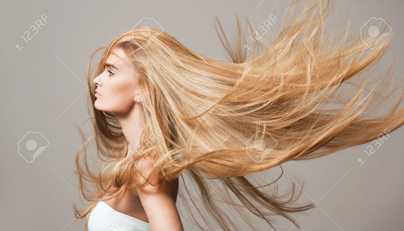 Portrait of a blond beauty with beautiful healthy long hair. - 52411076 Portrait of a blond beauty with beautiful healthy long hair. - 52411076