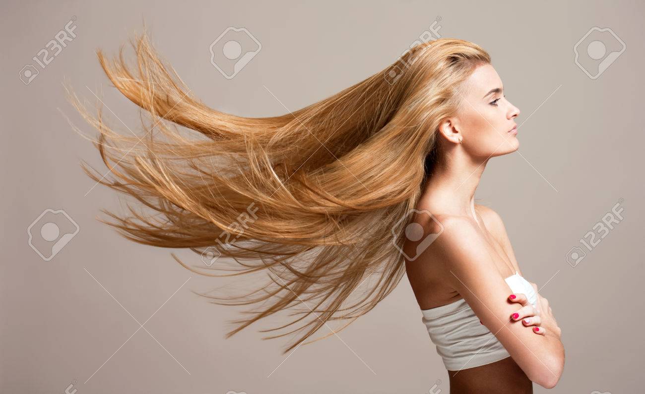 Portrait Of A Beautiful Young Blond Woman With Amazing Flowing Stock Photo Picture And Royalty Free Image Image