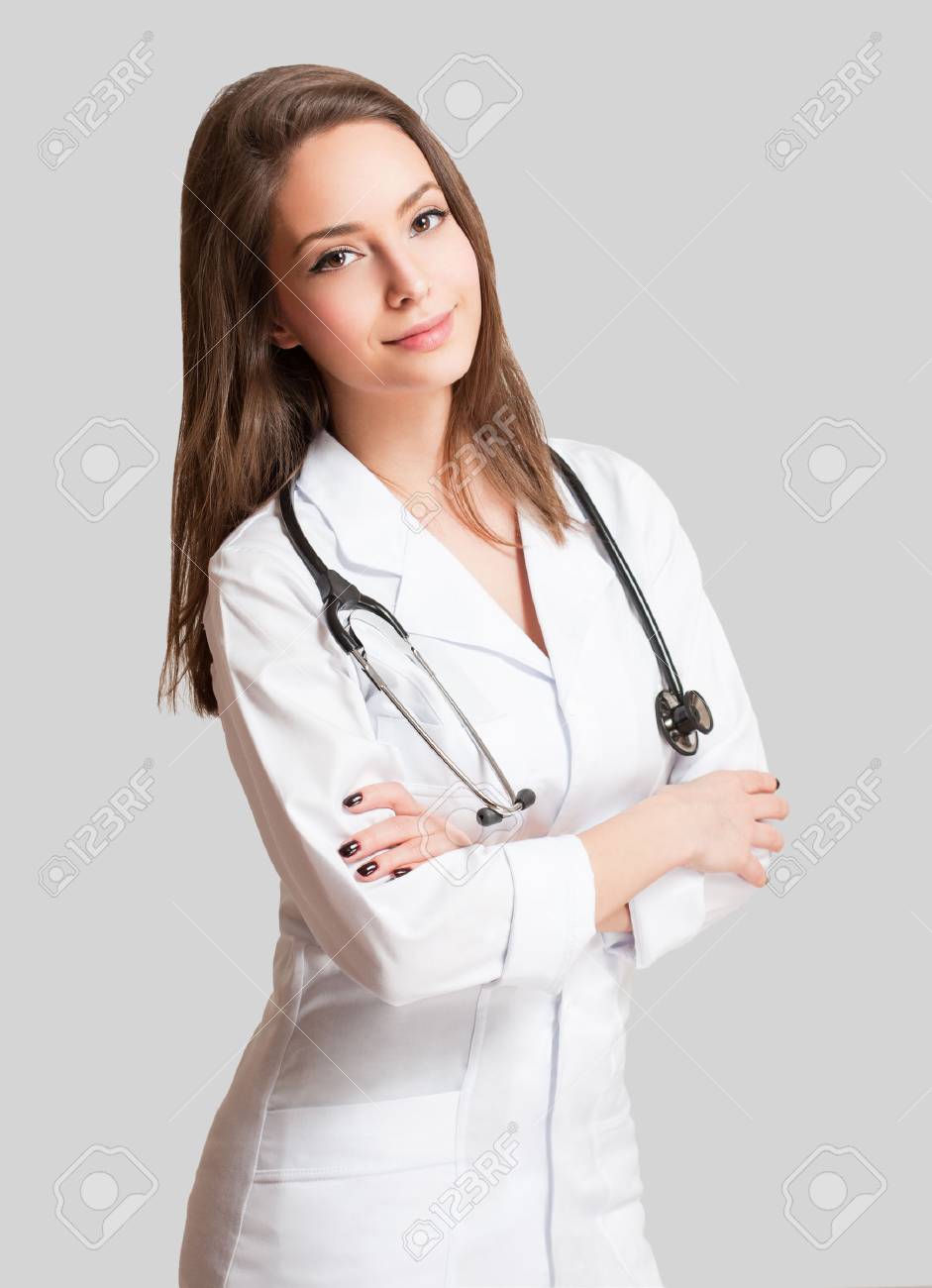 Portrait of an attractive young female doctor in white coat. - 52548478 Portrait of an attractive young female doctor in white coat. - 52548478