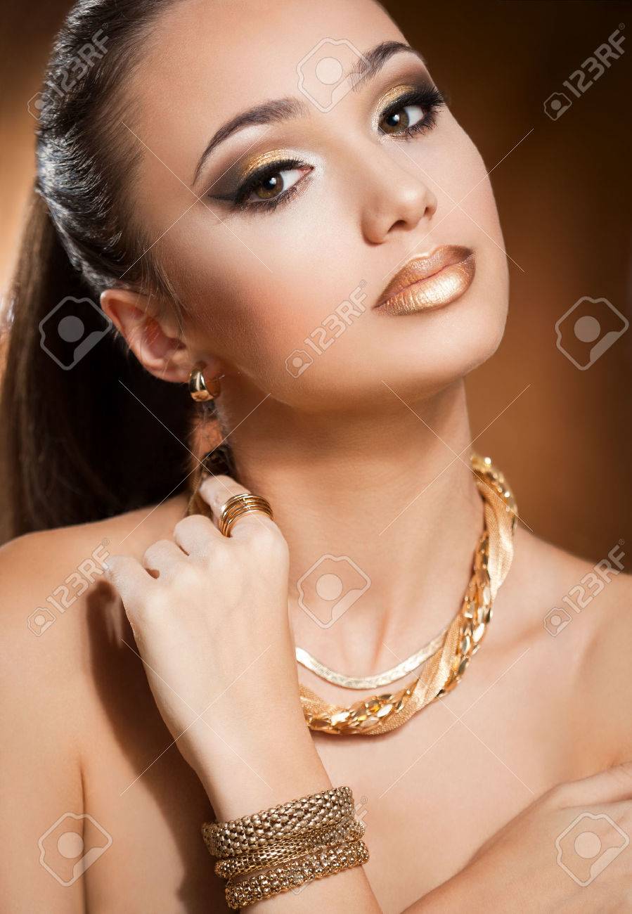 girl wearing gold jewellery