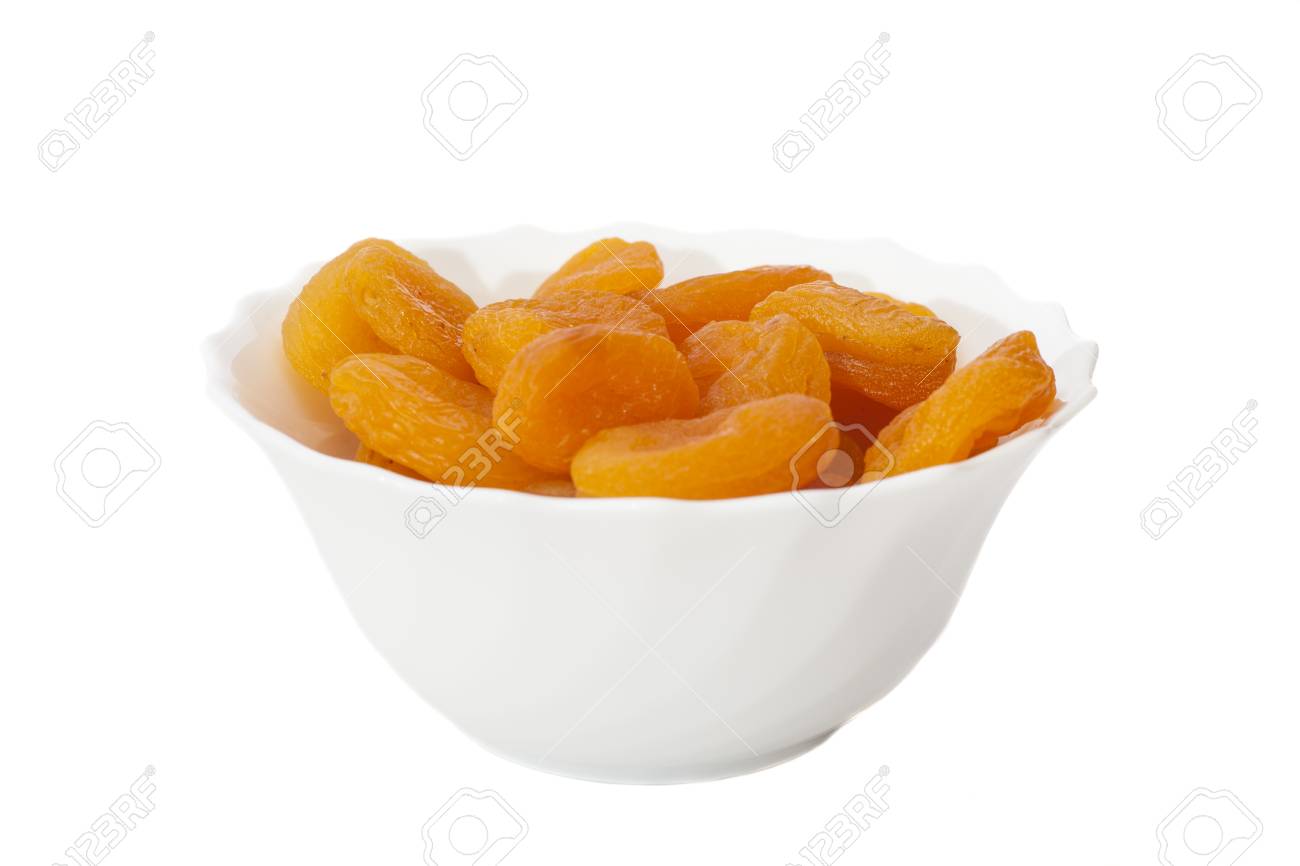 Dried apricots in bowl isolated on white - 30182304 Dried apricots in bowl isolated on white - 30182304