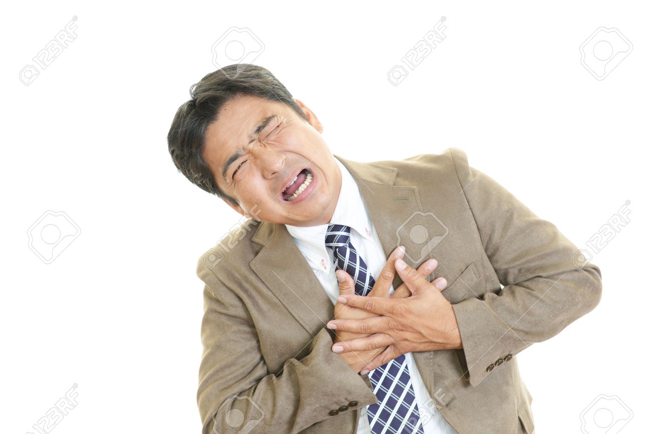 Man Having A Heart Attack Stock Photo Picture And Royalty Free
