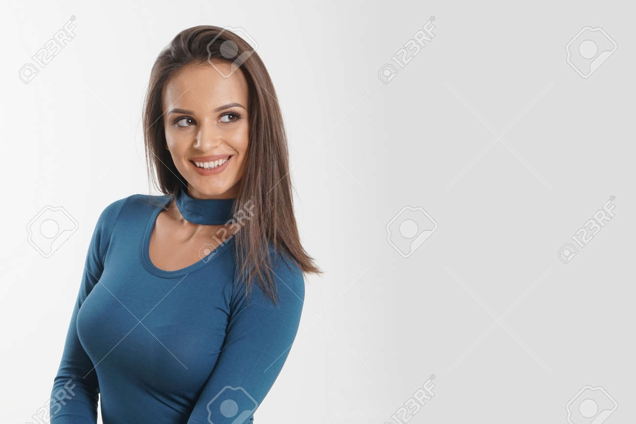 Portrait of an emotionally beautiful woman laughing while looking to the side. Beauty face portrait. Beautiful model girl with perfect fresh clean skin. Concept for youth and skin care - 166482594 Portrait of an emotionally beautiful woman laughing while looking to the side. Beauty face portrait. Beautiful model girl with perfect fresh clean skin. Concept for youth and skin care - 166482594