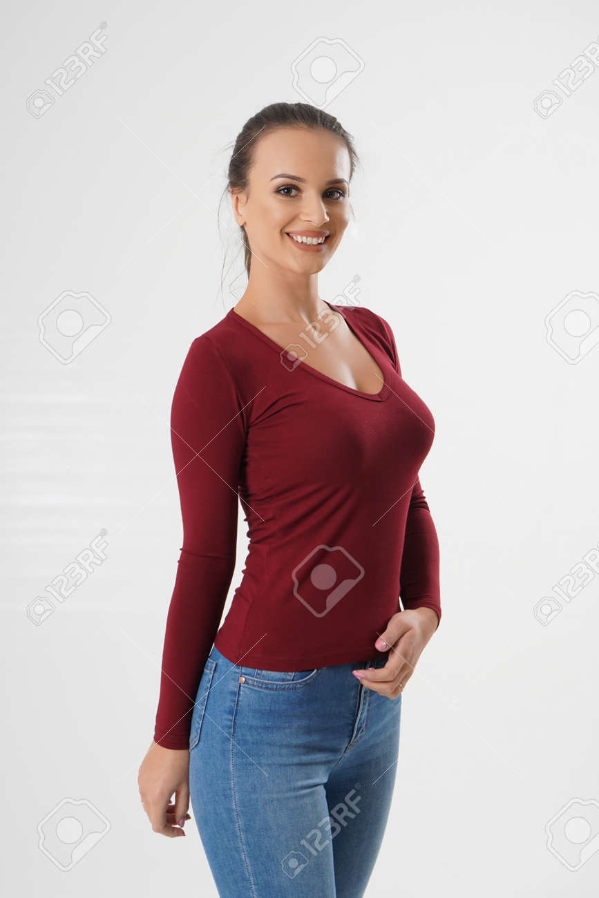 Portrait of an emotionally beautiful woman. Beauty face portrait. Beautiful model girl with perfect fresh clean skin. Girl with red blouse and jeans - 166580144 Portrait of an emotionally beautiful woman. Beauty face portrait. Beautiful model girl with perfect fresh clean skin. Girl with red blouse and jeans - 166580144