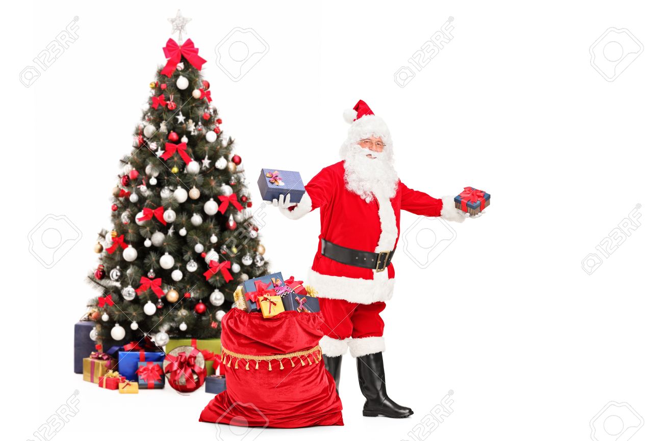 santa claus giving gifts from a bag full of presents and decorated christmas tree in the - Santa Claus With Presents santa claus giving gifts from a bag full of presents and decorated christmas tree in the - Santa Claus With Presents