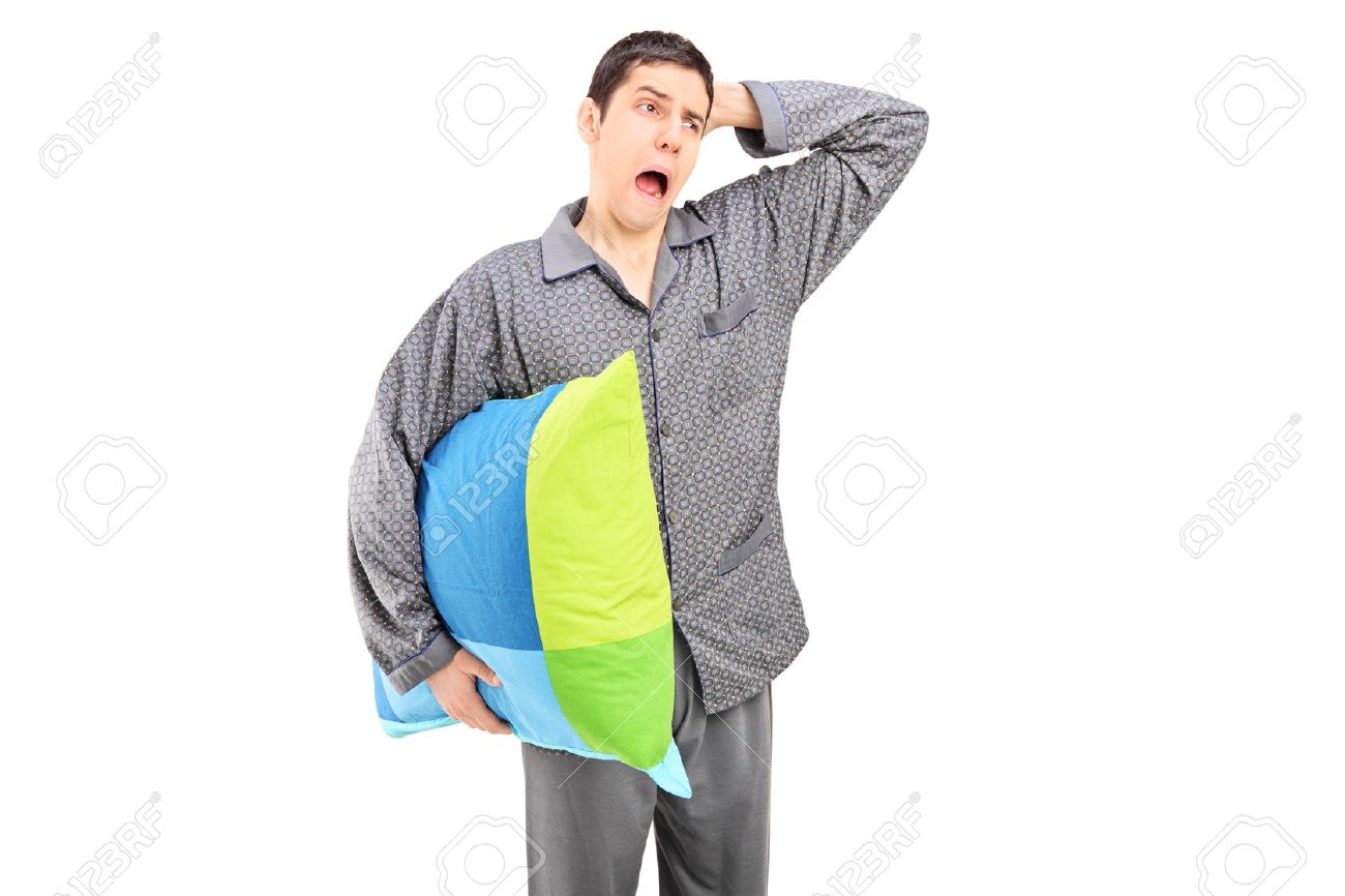 man holding pillow