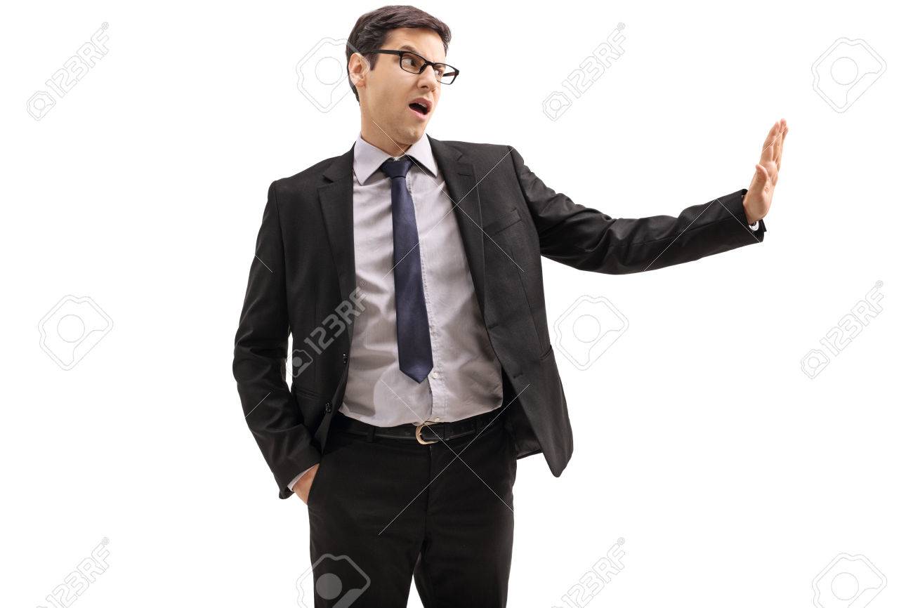 Businessman making a refuse gesture with his hand isolated on white background - 86039649 Businessman making a refuse gesture with his hand isolated on white background - 86039649