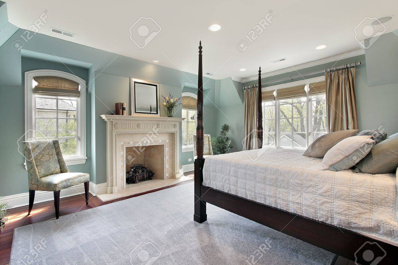 Luxury Homes Master Bedroom master bedroom in luxury home with marble fireplace stock photo Luxury Homes Master Bedroom master bedroom in luxury home with marble fireplace stock photo
