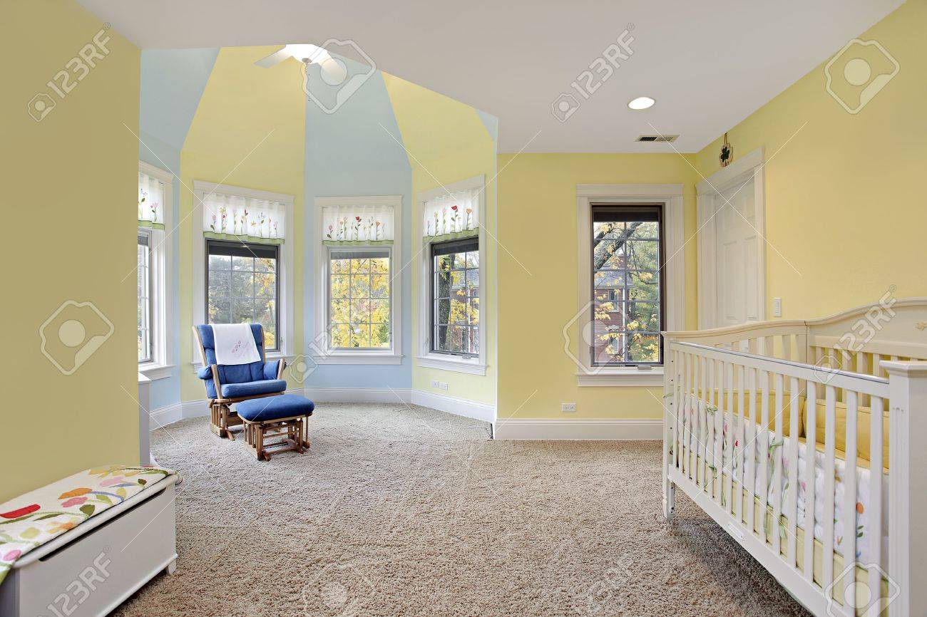 Baby S Bedroom With Yellow And Blue Walls