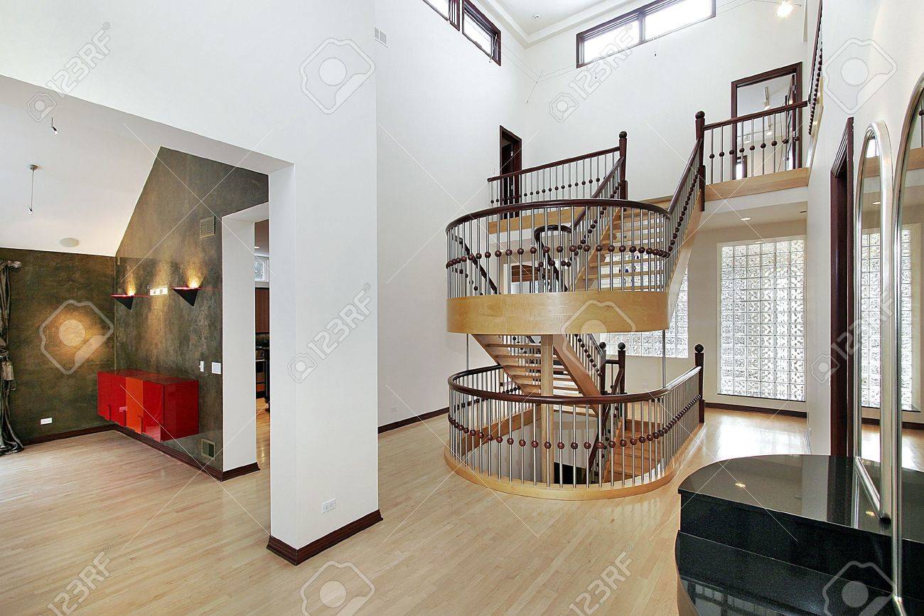 Foyer In Upscale Home With Double Staircase Stock Photo Picture