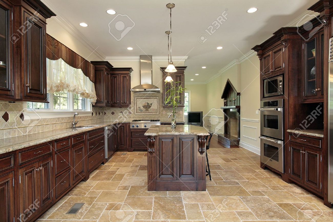 Large Kitchen In Luxury Home With Cherry Wood Cabinetry Stock Large Kitchen In Luxury Home With Cherry Wood Cabinetry Stock