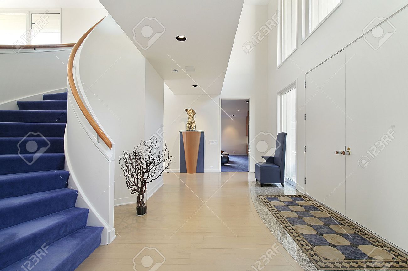 Foyer In Luxury Home With Spiral Staircase Stock Photo Picture