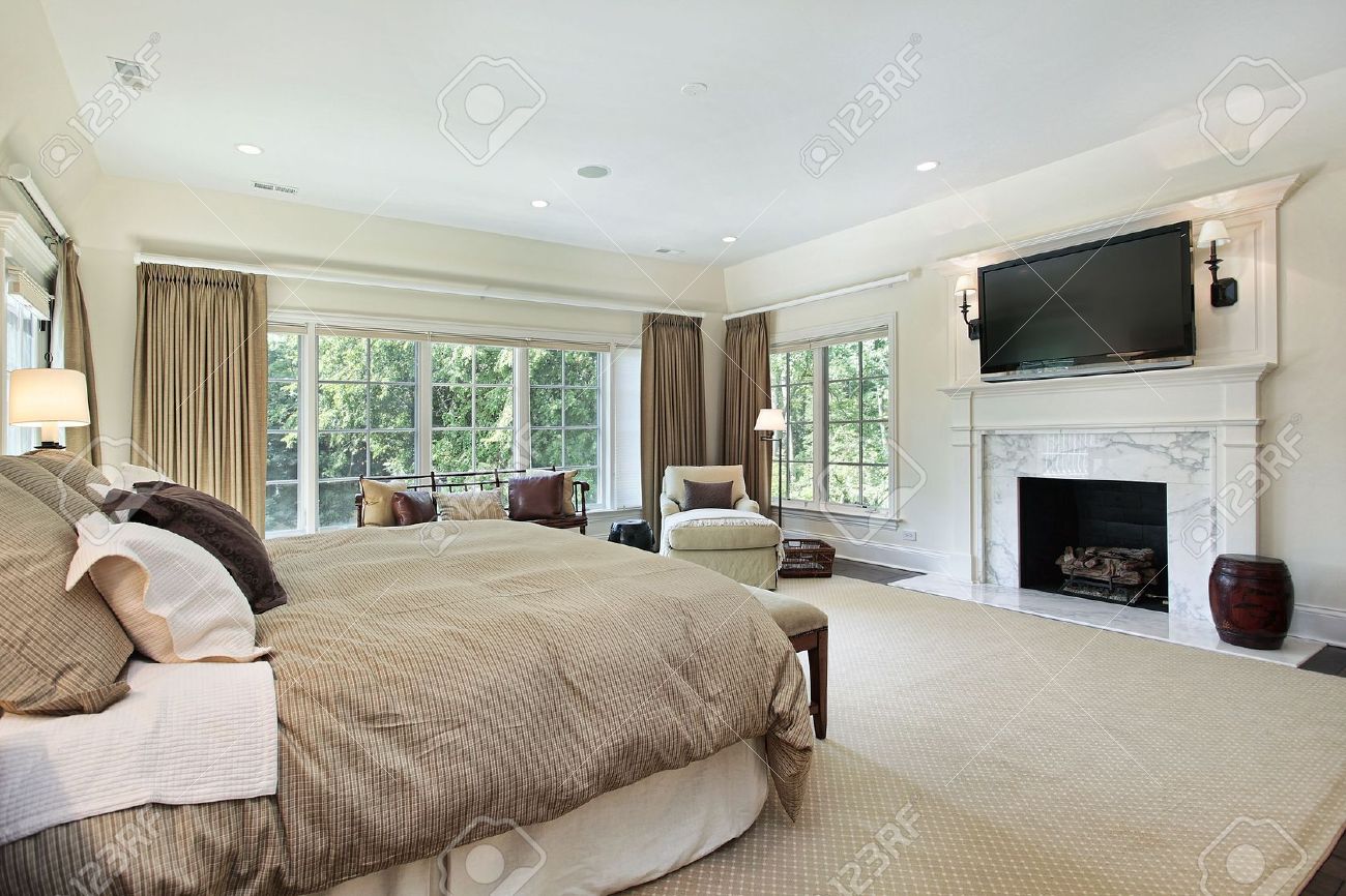 master bedroom in luxury home with marble fireplace stock photo 6738909 - Luxury Homes Master Bedroom master bedroom in luxury home with marble fireplace stock photo 6738909 - Luxury Homes Master Bedroom