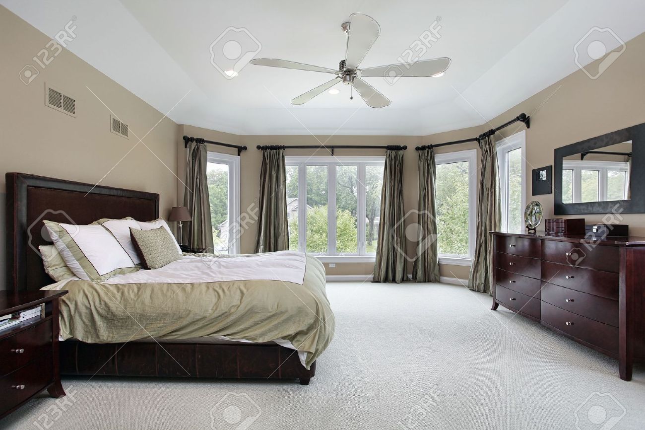 Luxury Homes Master Bedroom master bedroom in luxury home with wall of windows stock photo Luxury Homes Master Bedroom master bedroom in luxury home with wall of windows stock photo