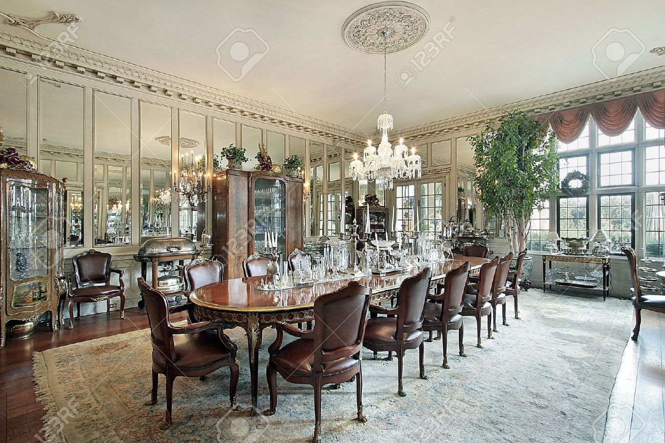 Traditional Home Dining Rooms formal dining room in traditional home with wall mirrors stock Traditional Home Dining Rooms formal dining room in traditional home with wall mirrors stock