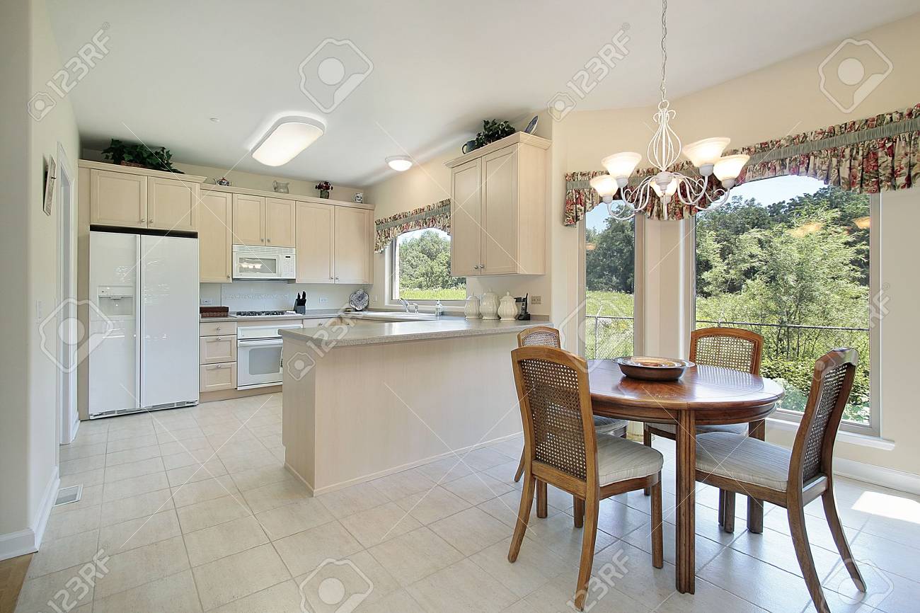 Kitchen With Eating Area And Forest View Stock Photo Picture And