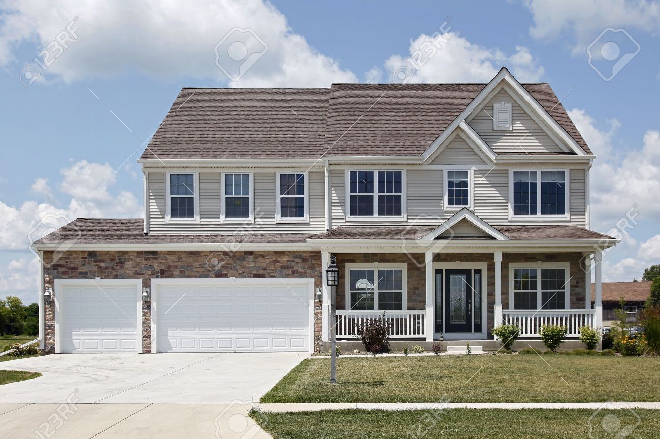 Stone two story home with front porch