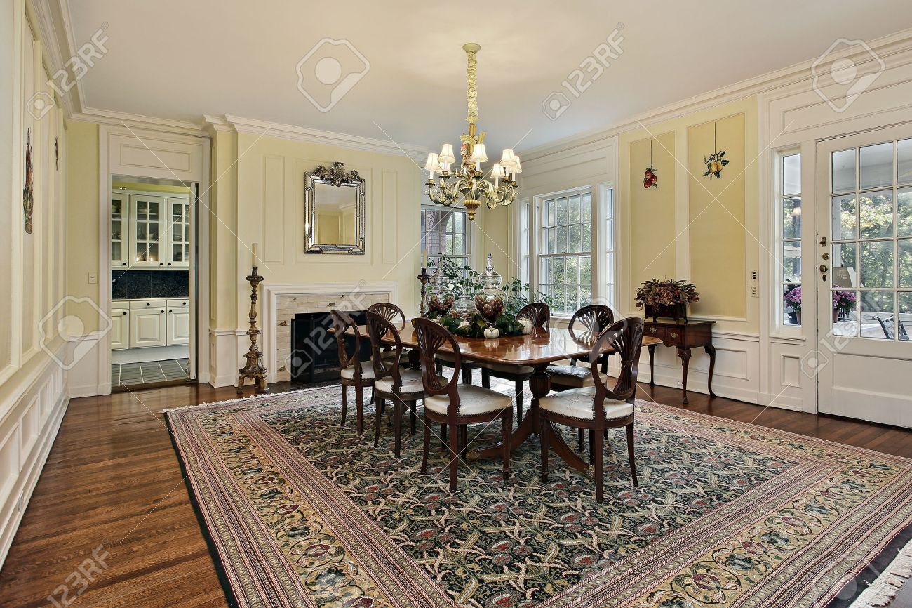 Large Dining Room In Luxury Home With Fireplace Stock Photo ... Large Dining Room In Luxury Home With Fireplace Stock Photo ...