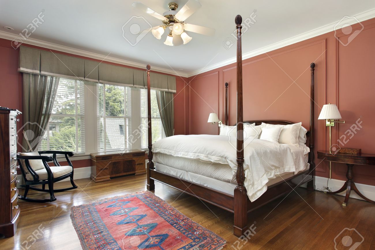 Luxury Homes Master Bedroom master bedroom in luxury home with salmon colored walls stock Luxury Homes Master Bedroom master bedroom in luxury home with salmon colored walls stock