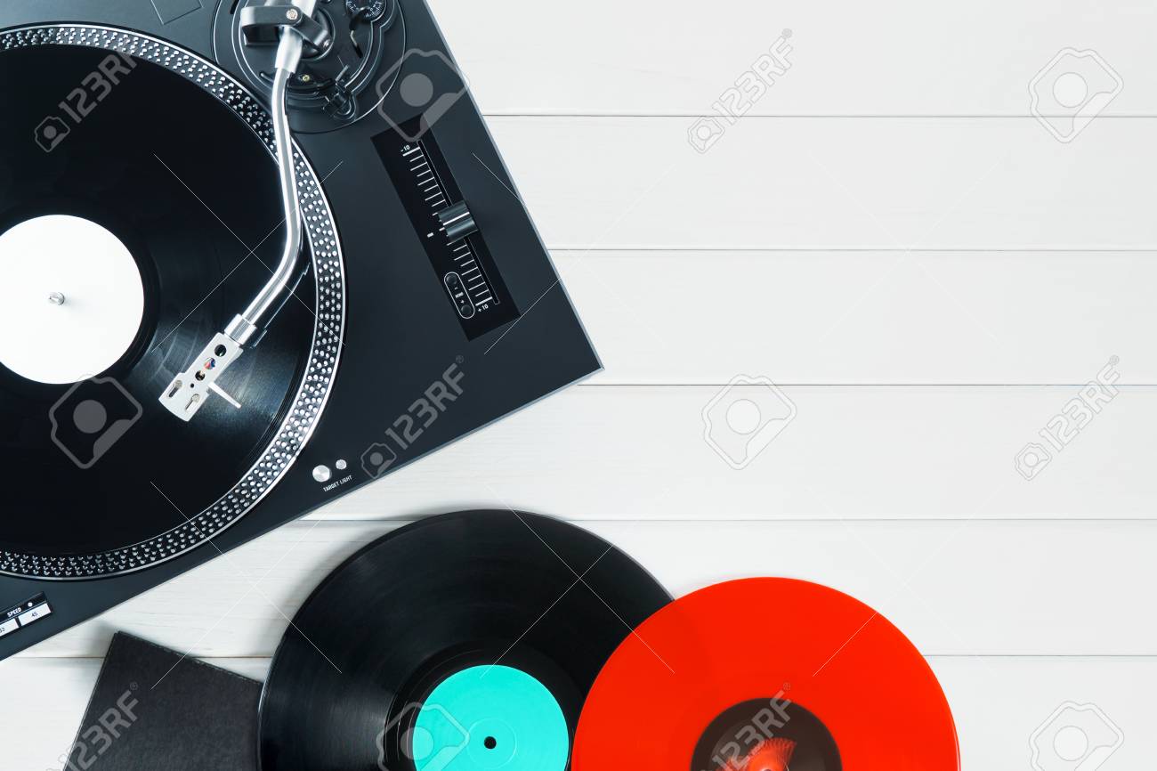 turntable vinyl record player with vinyl records and headphones