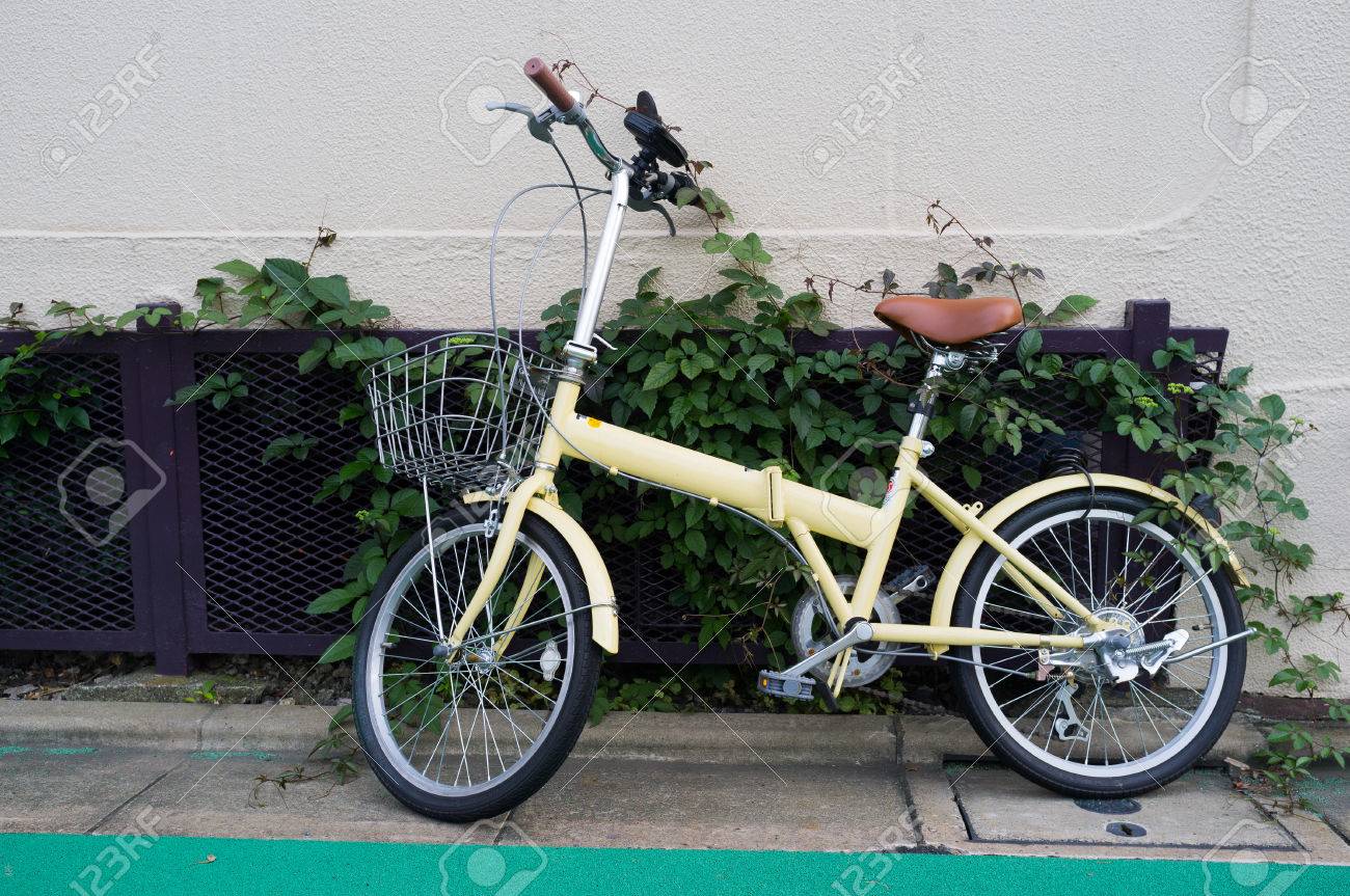 yellow folding bike