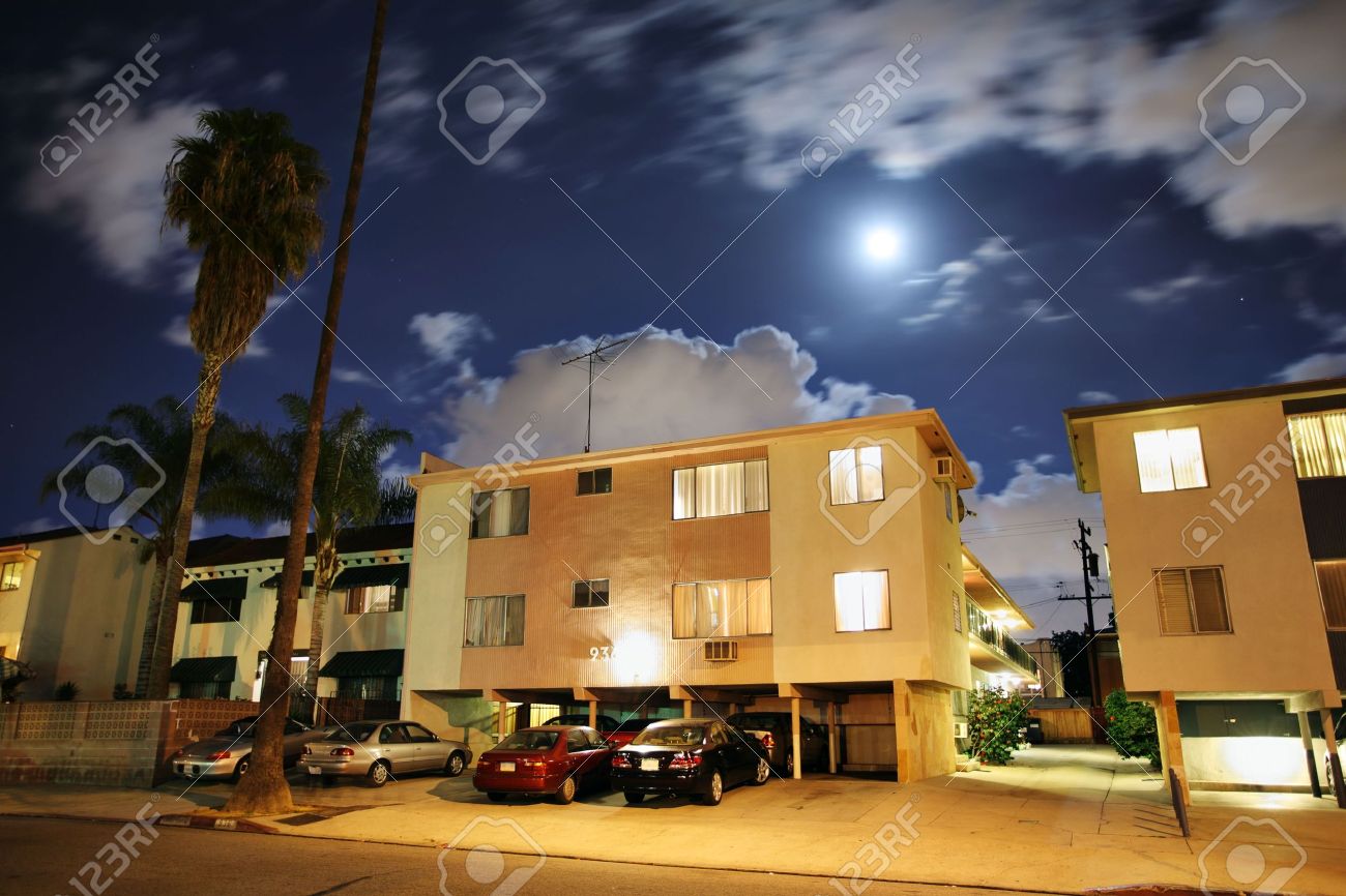 Apartment Building At Night residential street with apartment buildings at night at los Apartment Building At Night residential street with apartment buildings at night at los
