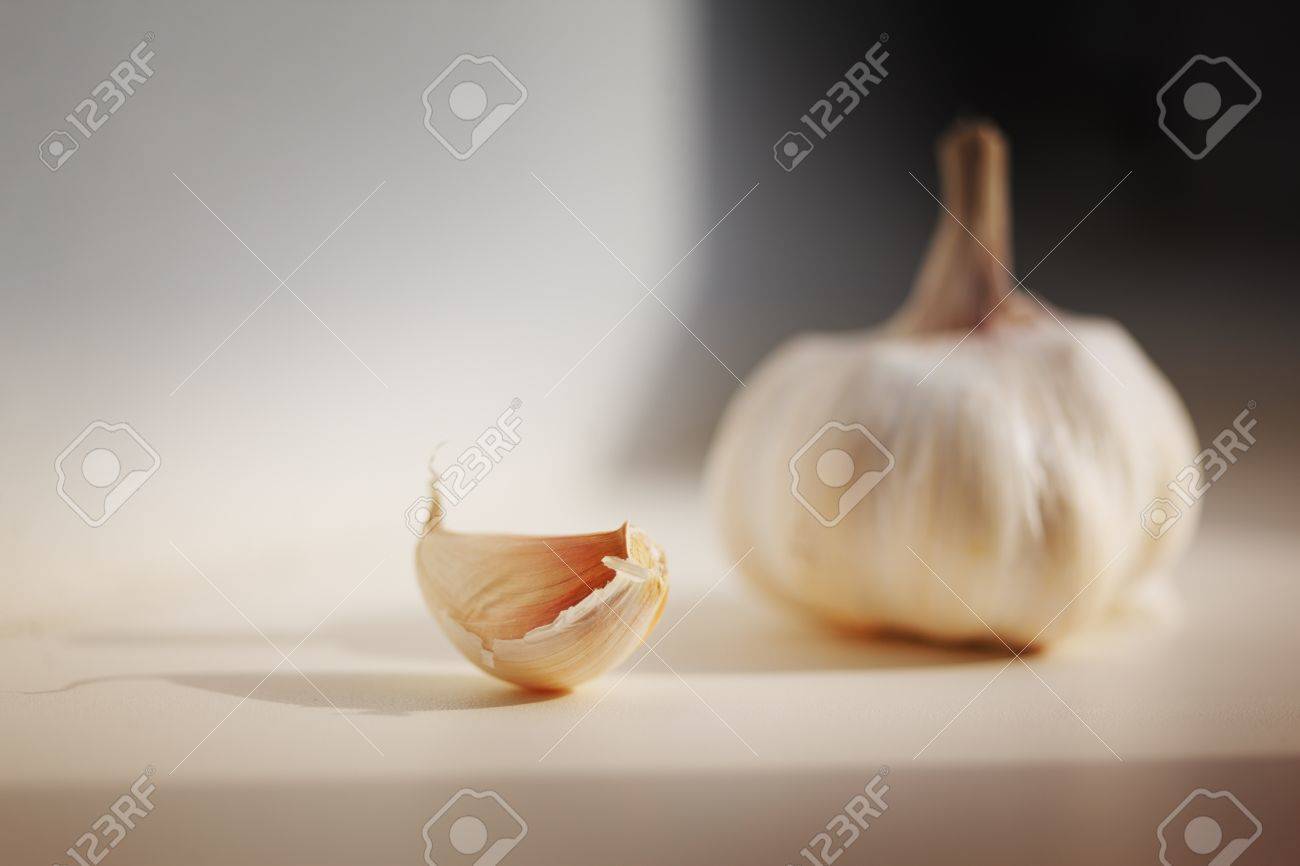 Kitchen Table Close Up garlic on kitchen table, macro closeup stock photo, picture and Kitchen Table Close Up garlic on kitchen table, macro closeup stock photo, picture and