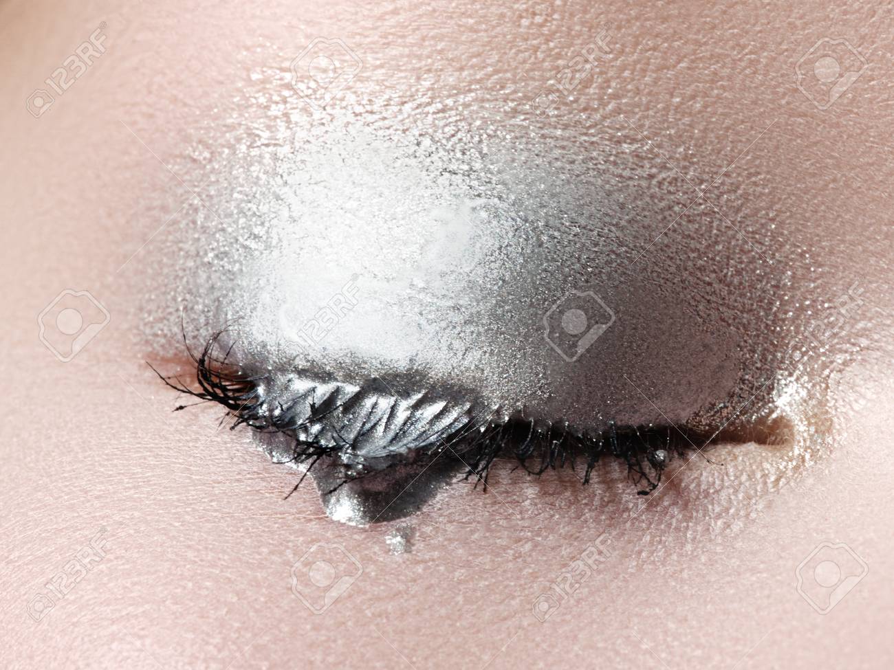 Closed Eyes Of Young Woman With Shining Sparkle Makeup Closeup