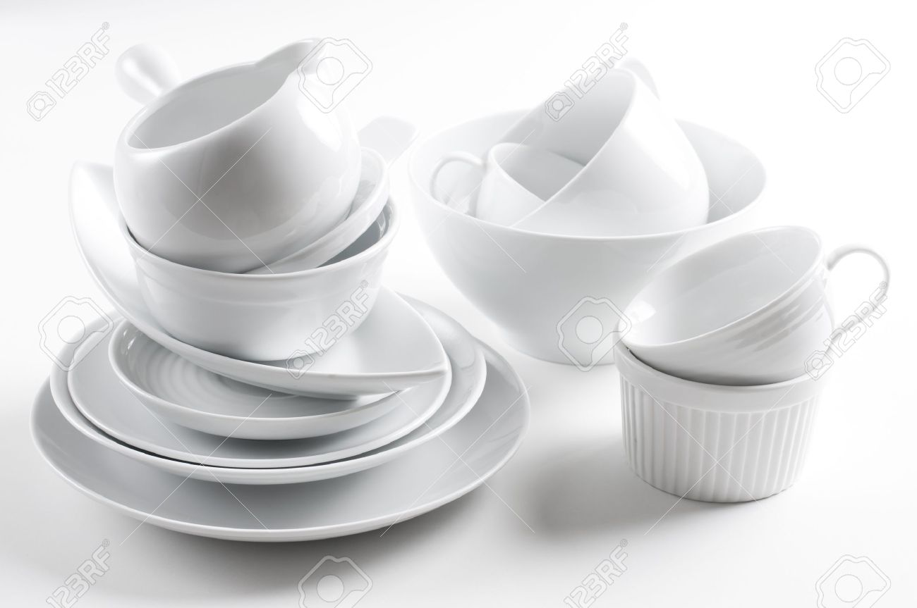 White Kitchen Utensils a lot of white crockery and kitchen utensils on white background White Kitchen Utensils a lot of white crockery and kitchen utensils on white background
