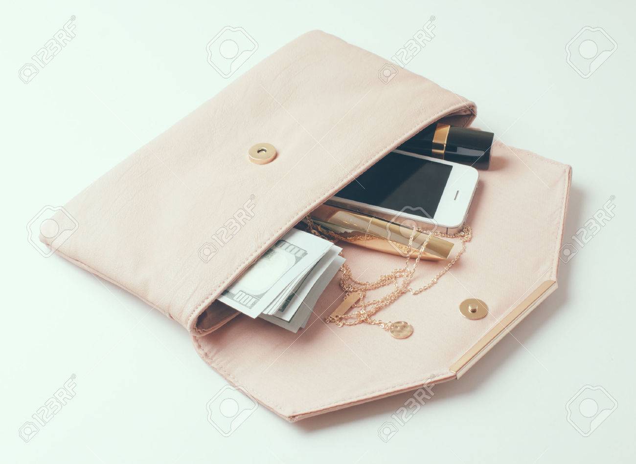 beige clutch purse