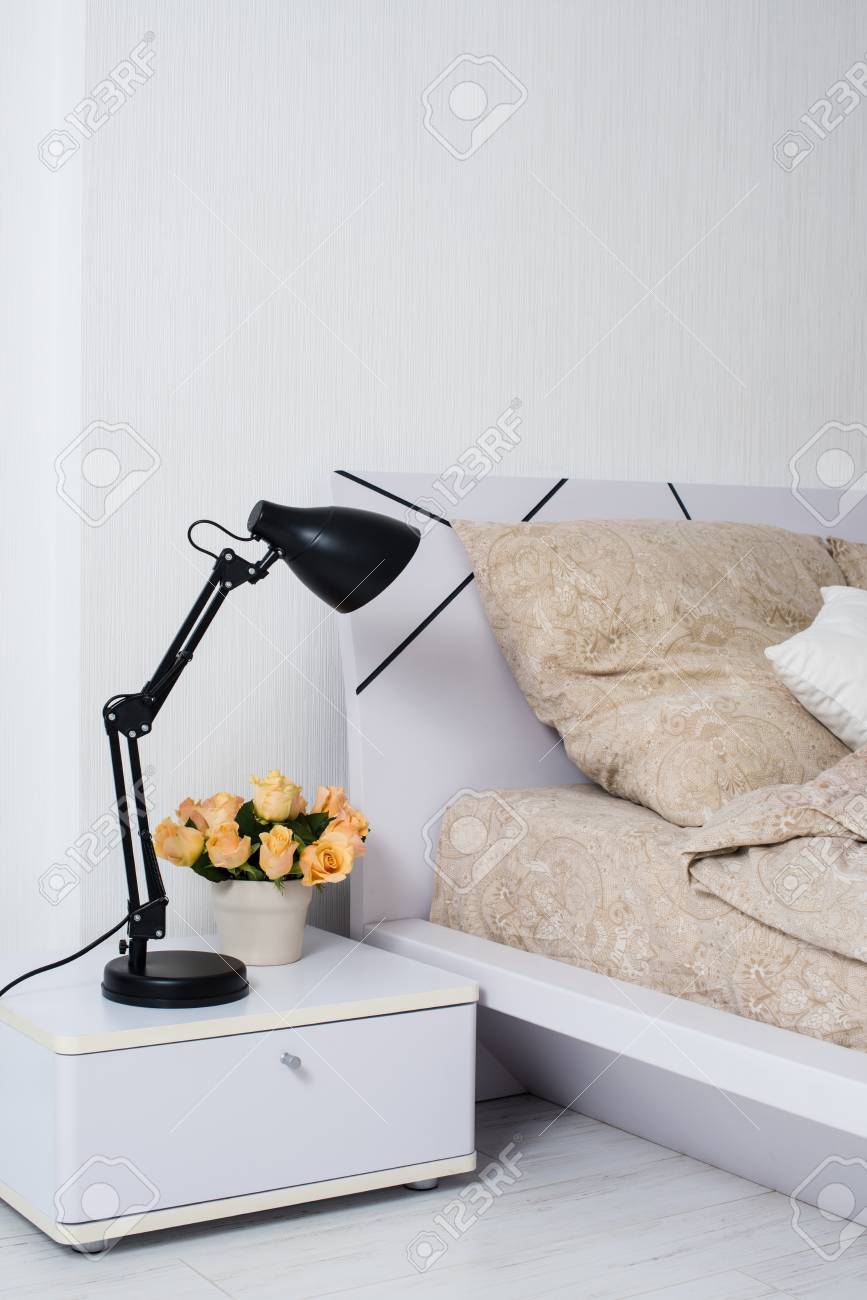 Bright White Bedroom Interior Cozy Bed With Beige Linen Flowers Stock Photo Picture And Royalty Free Image Image 40462140