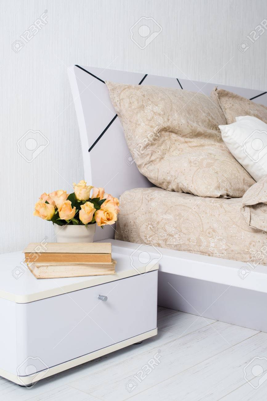 Bright White Bedroom Interior Cozy Bed With Beige Linen Flowers Stock Photo Picture And Royalty Free Image Image 40461383