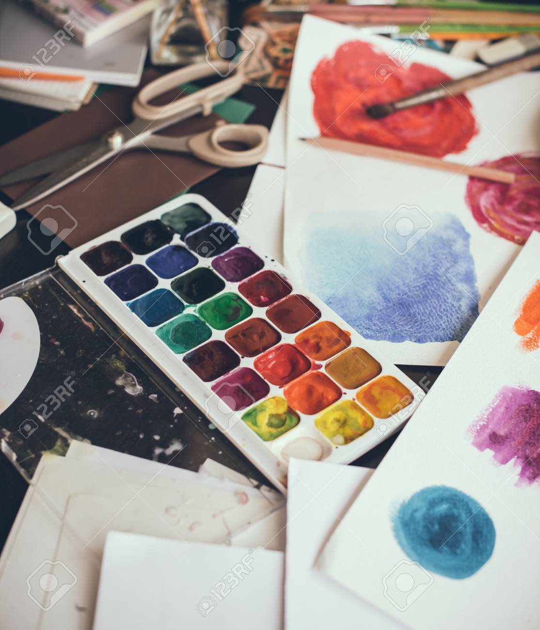 Mess In The The Artist's Studio, Watercolor Paints, Brushes And Sketches, Palette And Painting Tools. Designer's Working Place, Hipster Style. Stock Photo, Picture And Royalty Free Image. Image 43702327.