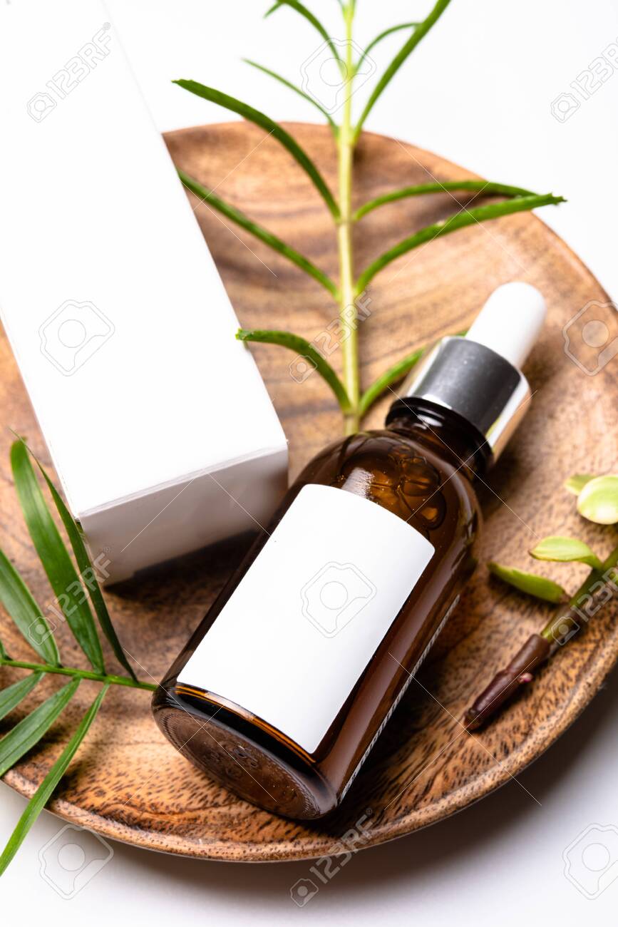 Download Brown Glass Cosmetic Bottle Mock Up With Blank White Label And Stock Photo Picture And Royalty Free Image Image 130389404