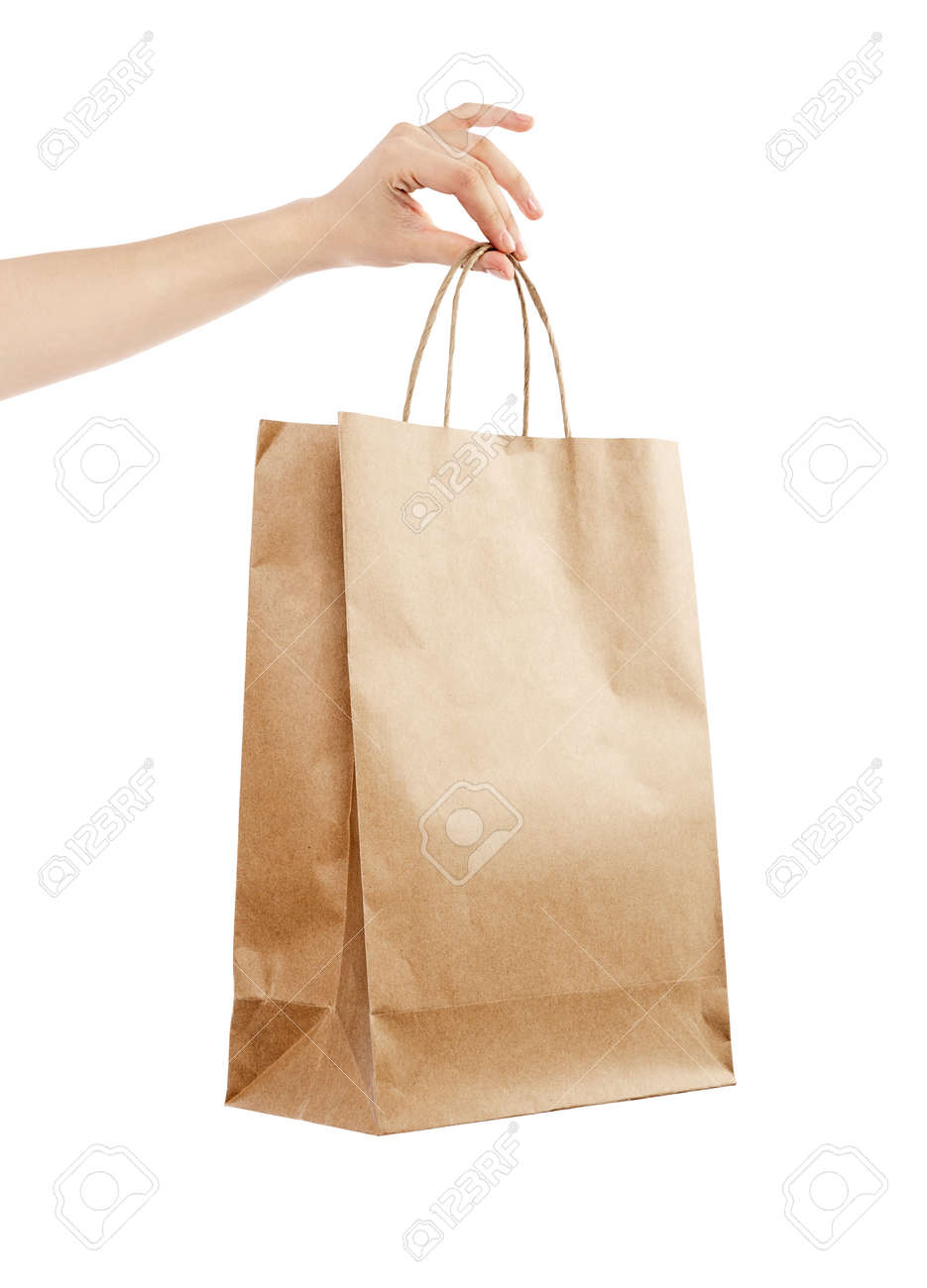 Download Female Hand Holding Kraft Paper Shopping Bag Design Mockup Isolated Stock Photo Picture And Royalty Free Image Image 153168778
