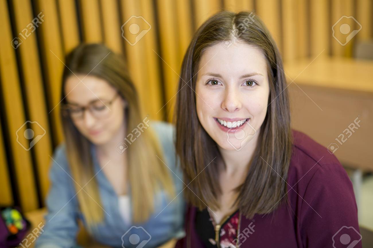 a studying young teenage college student girl in a school stock teenage college
