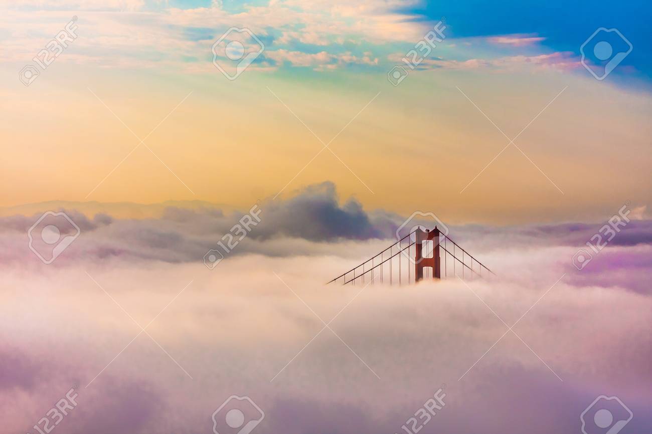 World Famous Golden Gate Bridge Surrounded by Fog after Sunrise in San Francisco,California - 20900287 World Famous Golden Gate Bridge Surrounded by Fog after Sunrise in San Francisco,California - 20900287
