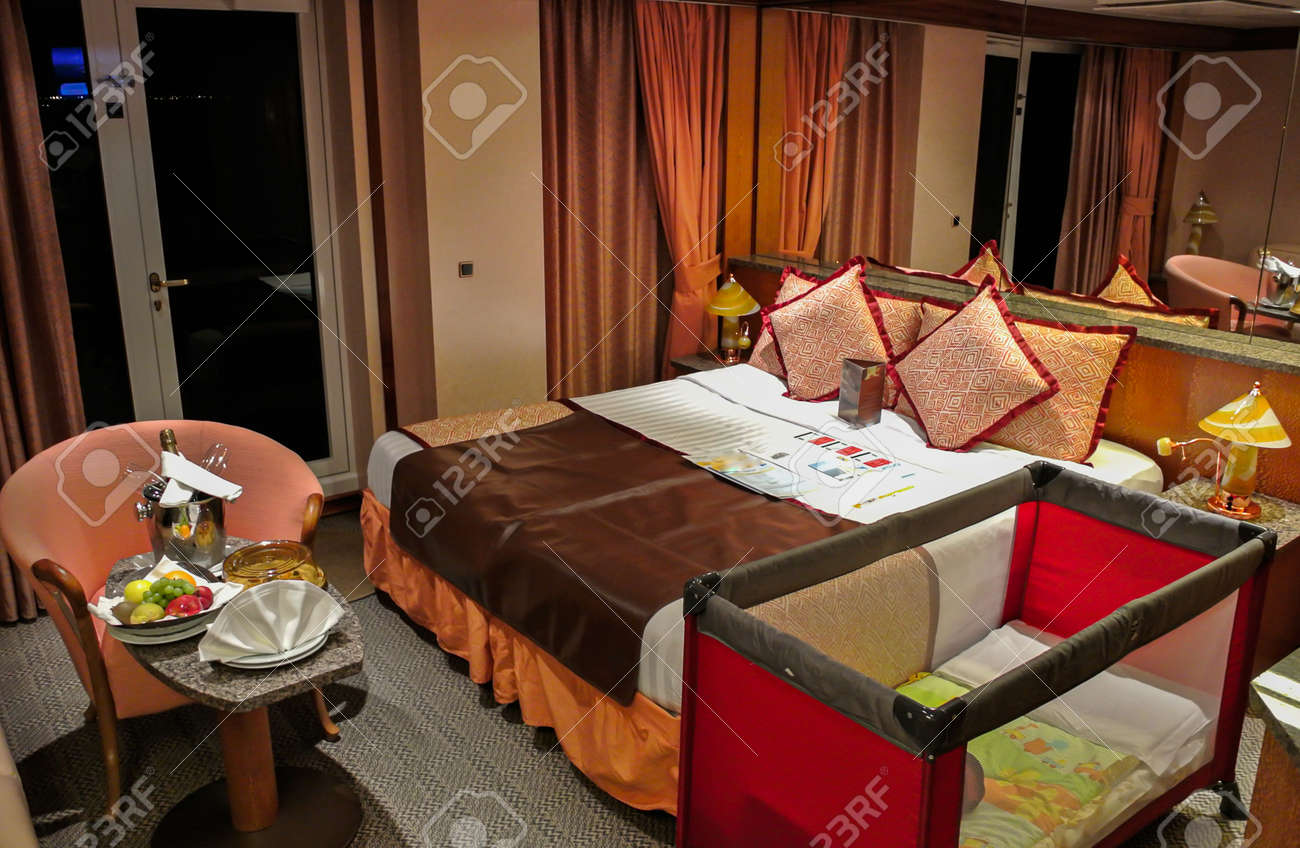 double bed with baby cot