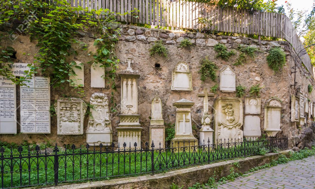ancient burial tombstones affixed to the walls at the cathedral