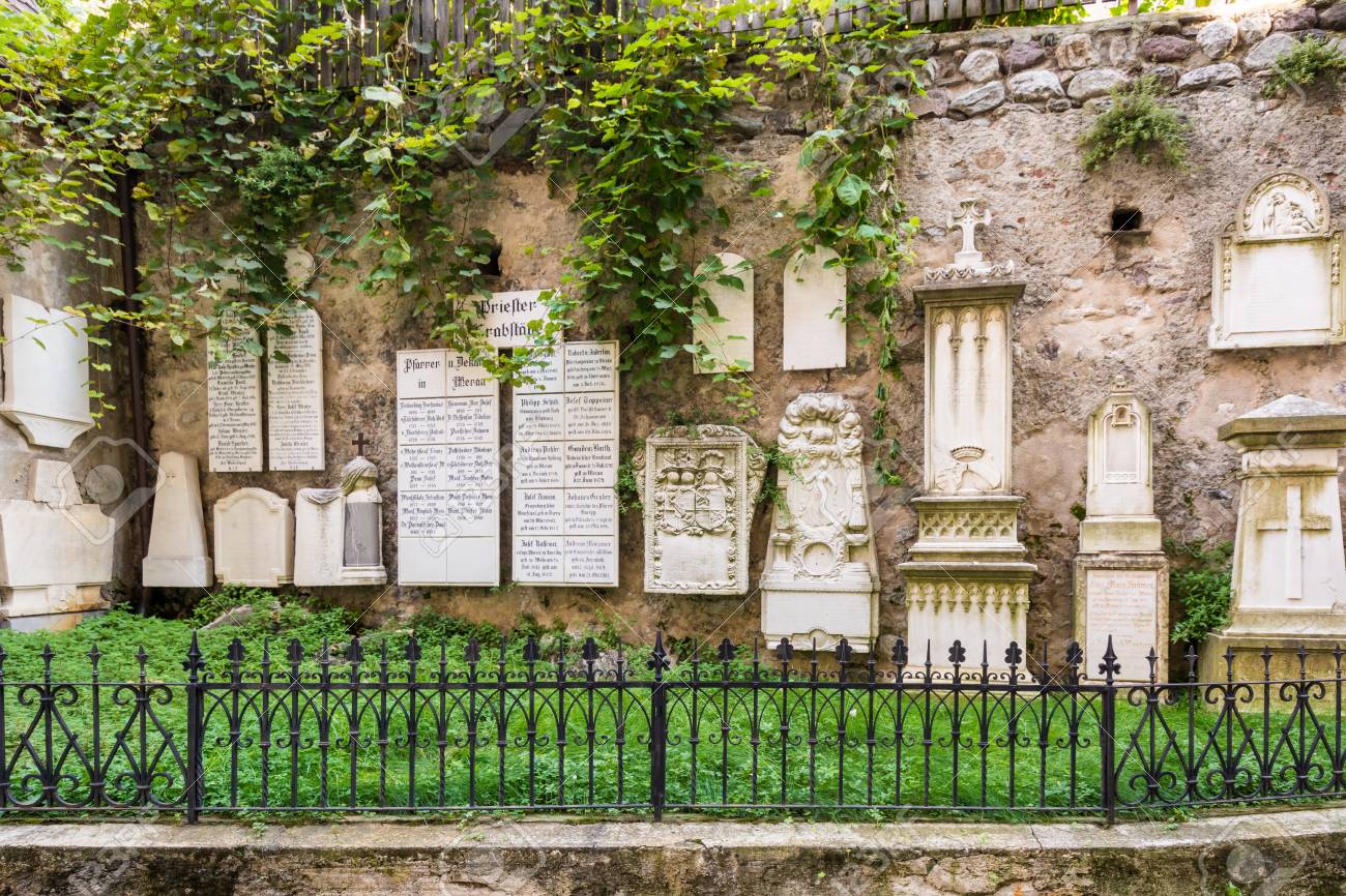 ancient burial tombstones affixed to the walls at the cathedral